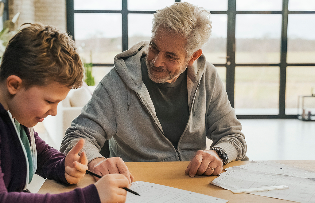 A father helping his son with homework
